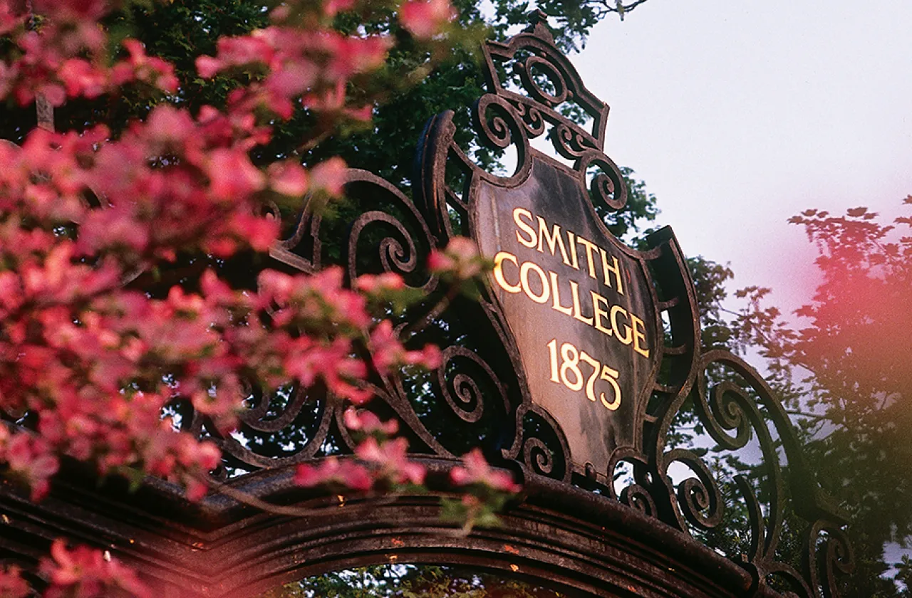 Detail shot of the top of the Grecourt Gates with spring flowers