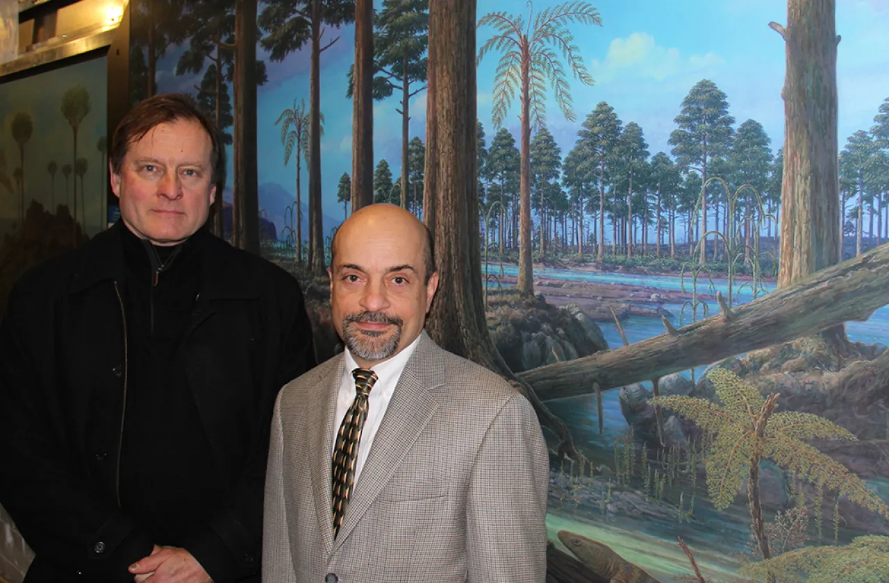 Mural artist Robert Evans (left) and Michael Marcotrigiano in front of the mural