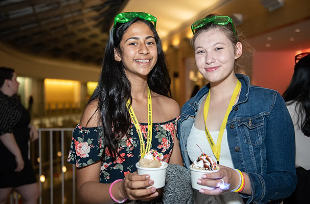 Two students holding ice cream