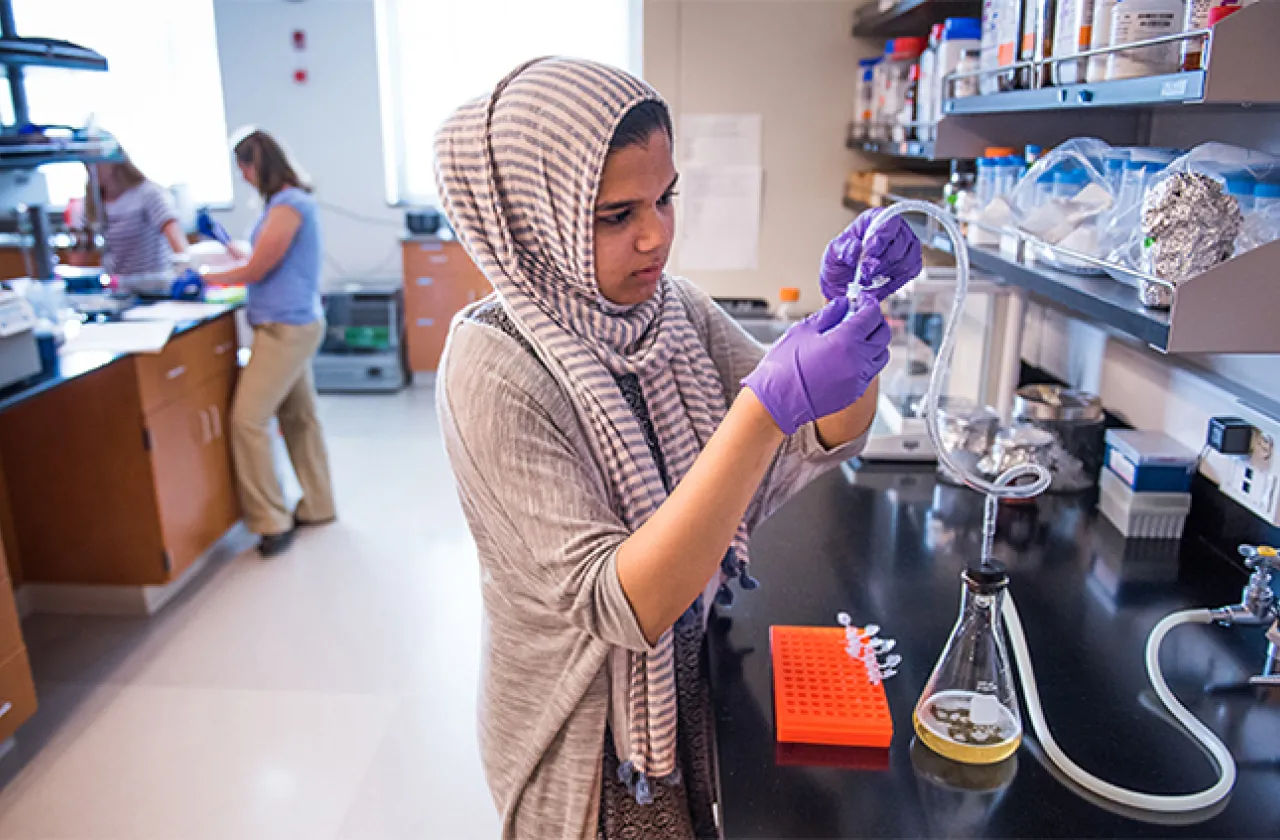 Student working in Ford Hall lab