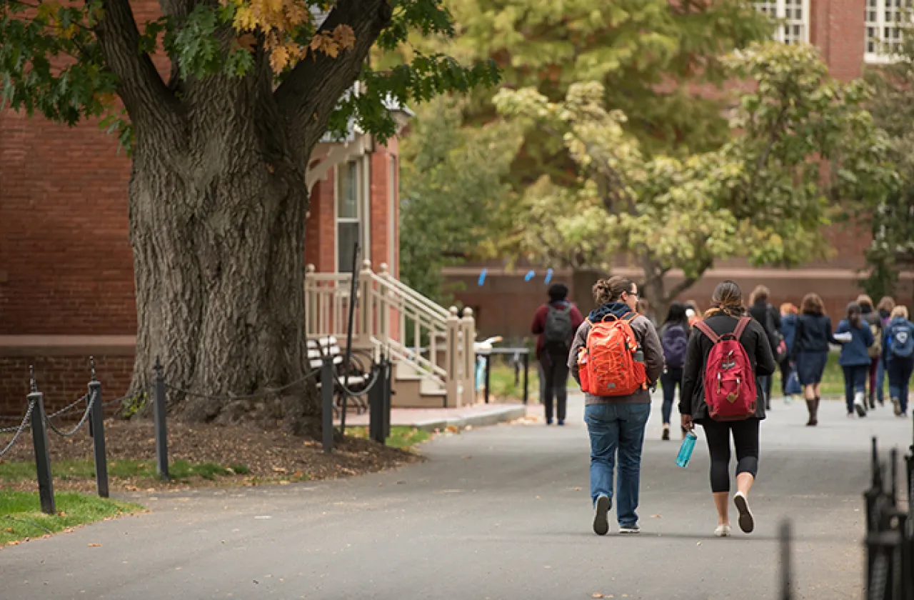 Students walking outside on campus