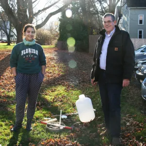 Professor and student outside