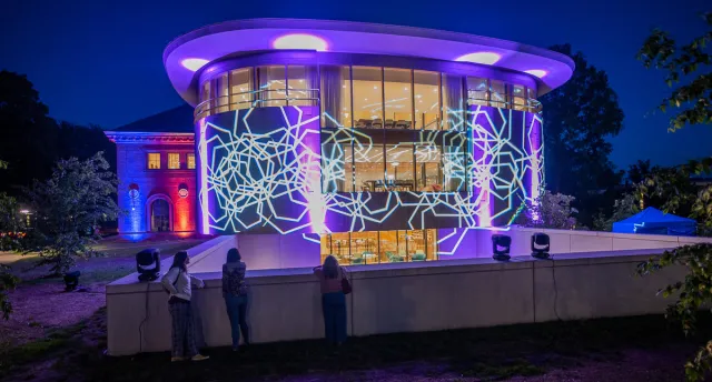 Smith College's Neilson Library at night during Reunion 2023