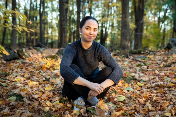 Tess Abbot in a fall landscape