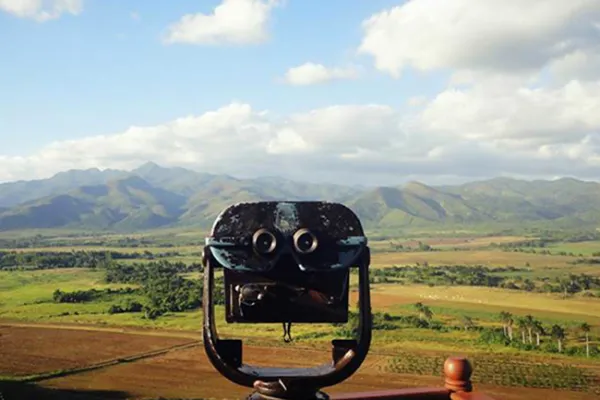 Tourist binoculars overlooking a view of the valley
