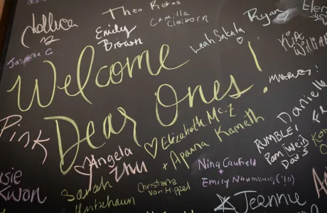 Smithies signed their names on chalk boards during Reunion II