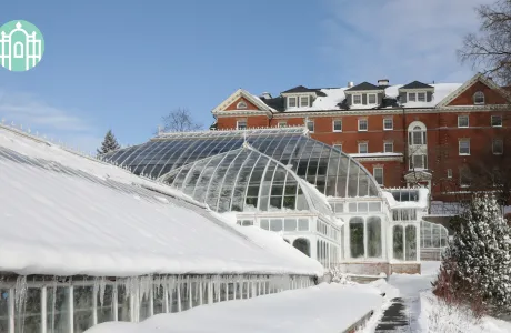 Lyman plant house covered in snow
