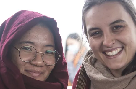 Student posing with nun