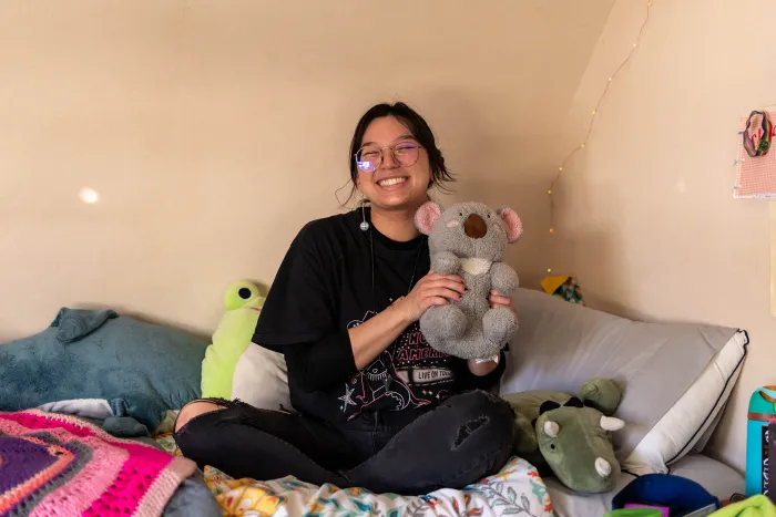 Cloud Osmond poses with a stuffed koala.