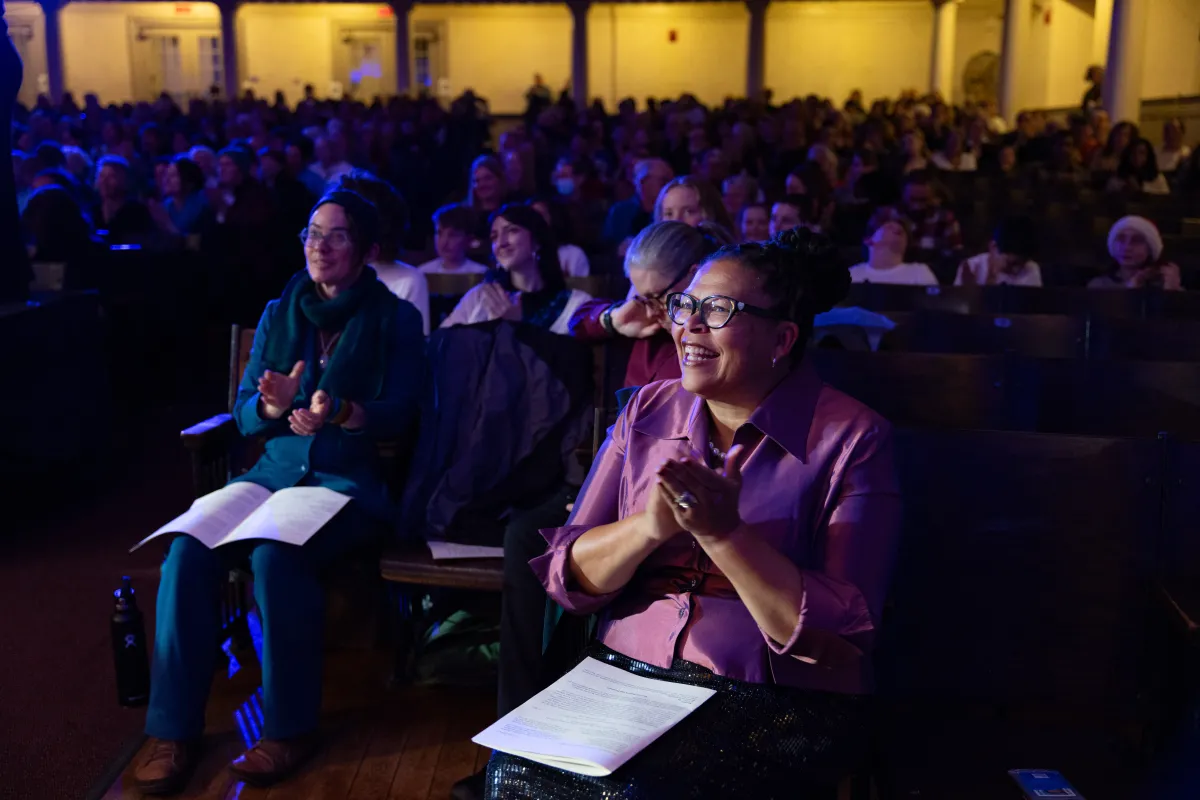 President Sarah clapping while watching a performance during the 2024 Cromwell Day.