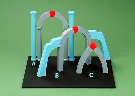 Model with three arch-shaped structures labeled A, B, and C on a black base. Each arch has blue pillars and gray stone with red accents.