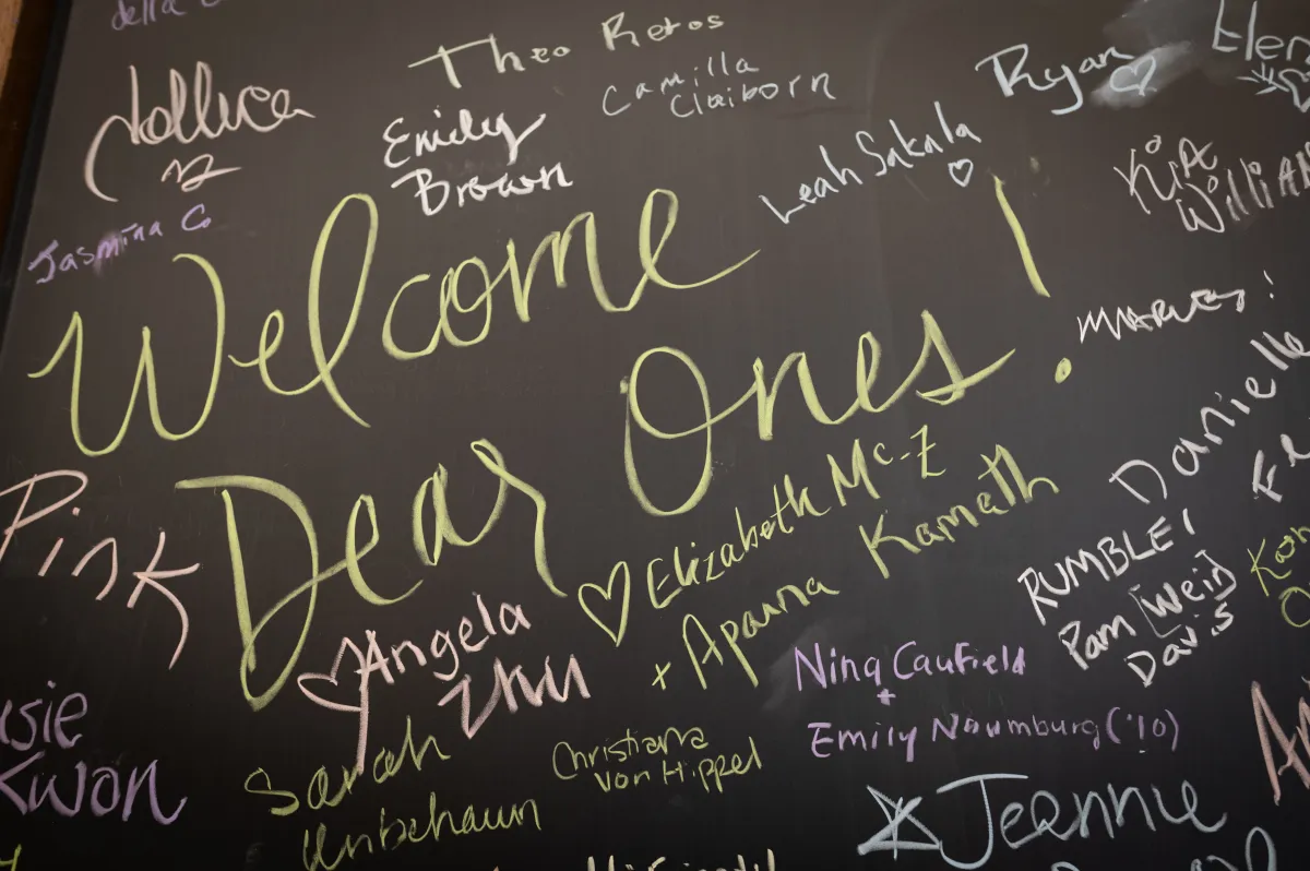 Smithies signed their names on chalk boards during Reunion II