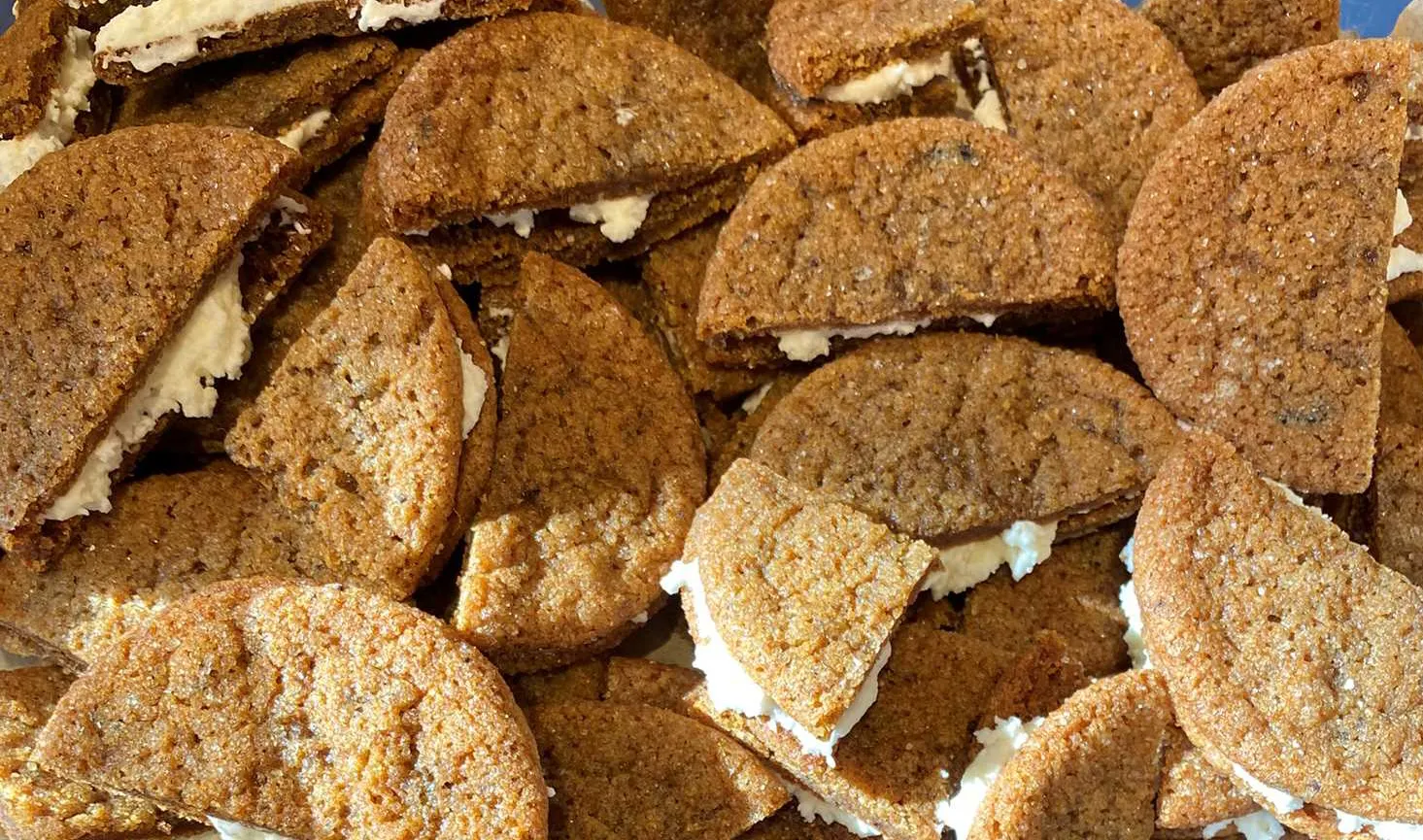 Close-up of gingersnap sandwich cookies.
