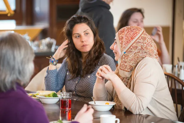 Students eating in the Quad dining room